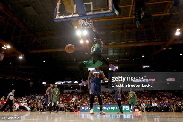 Kwame Brown of the 3 Headed Monsters dunks against 3's Company during week five of the BIG3 three on three basketball league at UIC Pavilion on July...