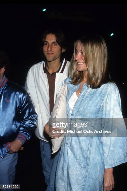 Chris Mancini, son of composer Henry Mancini, and Maureen McCormick aka Marcia Brady arrive at an event in 1977.