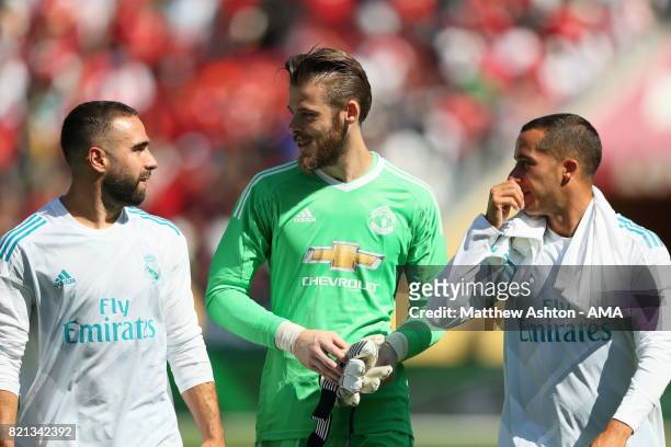 Dani Carvajal and Lucas Vazquez of Real Madrid chat to David de Gea of Manchester United during the International Champions Cup 2017 match between...