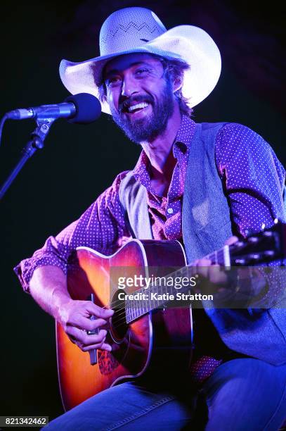 Musician Ryan Bingham performs onstage during a night under the desert stars with Ryan Bingham: A Fundraiser for the Mojave Desert Land Trust at...