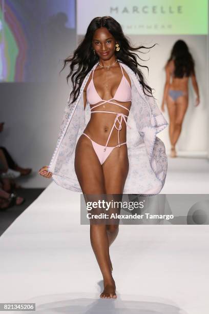 Model walks the runway at SWIMMIAMI Mia Marcelle 2018 Collection at SWIMMIAMI tent on July 23, 2017 in Miami Beach, Florida.