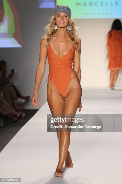 Model walks the runway at SWIMMIAMI Mia Marcelle 2018 Collection at SWIMMIAMI tent on July 23, 2017 in Miami Beach, Florida.