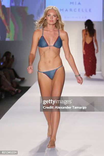 Model walks the runway at SWIMMIAMI Mia Marcelle 2018 Collection at SWIMMIAMI tent on July 23, 2017 in Miami Beach, Florida.