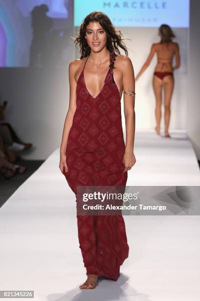 Model walks the runway at SWIMMIAMI Mia Marcelle 2018 Collection at SWIMMIAMI tent on July 23, 2017 in Miami Beach, Florida.