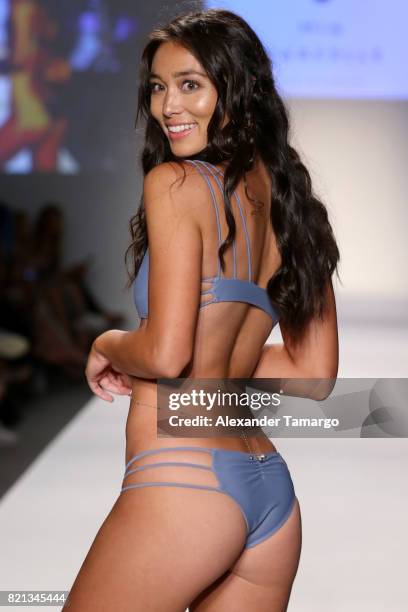 Model walks the runway at SWIMMIAMI Mia Marcelle 2018 Collection at SWIMMIAMI tent on July 23, 2017 in Miami Beach, Florida.