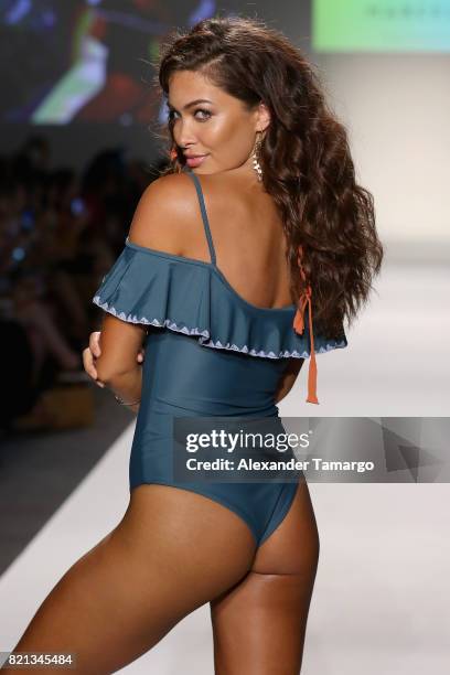 Model walks the runway at SWIMMIAMI Mia Marcelle 2018 Collection at SWIMMIAMI tent on July 23, 2017 in Miami Beach, Florida.