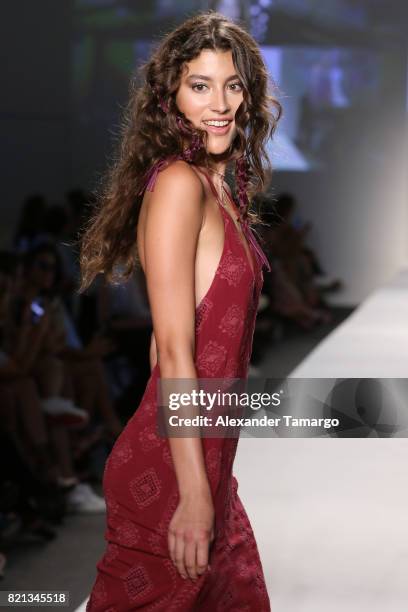 Model walks the runway at SWIMMIAMI Mia Marcelle 2018 Collection at SWIMMIAMI tent on July 23, 2017 in Miami Beach, Florida.