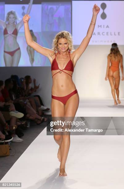 Model walks the runway at SWIMMIAMI Mia Marcelle 2018 Collection at SWIMMIAMI tent on July 23, 2017 in Miami Beach, Florida.