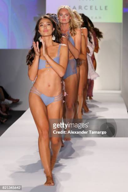 Models walk the runway at SWIMMIAMI Mia Marcelle 2018 Collection at SWIMMIAMI tent on July 23, 2017 in Miami Beach, Florida.