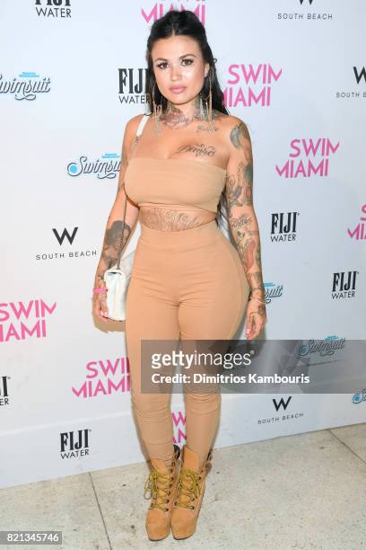 Tattoo Baby attends the SWIMMIAMI Versakini 2018 Collection Front Row at WET Deck at W South Beach on July 23, 2017 in Miami Beach, Florida.