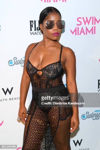 Nina Mills attends the SWIMMIAMI Versakini 2018 Collection Front Row at WET Deck at W South Beach on July 23, 2017 in Miami Beach, Florida.