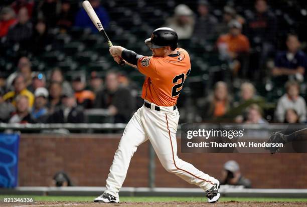 Conor Gillaspie of the San Francisco Giants hits a two-run homer with two out in the bottom of the ninth inning against the San Diego Padres at AT&T...
