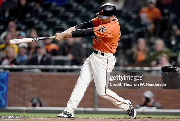 Conor Gillaspie of the San Francisco Giants hits a two-run homer with two out in the bottom of the ninth inning against the San Diego Padres at AT&T...