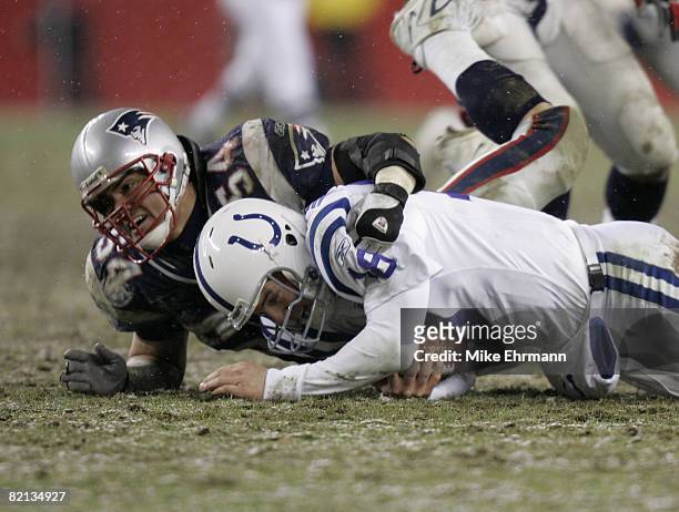 Linebacker Tedy Bruschi of the New England Patriots sacks Colts quarterback Peyton Manning during the AFC Division playoff game at Gillette Stadium...