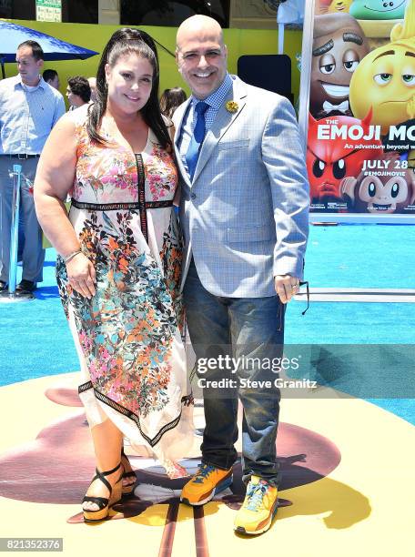 Producer Michelle Raimo Kouyate and director Tony Leondis arrives at the Premiere Of Columbia Pictures And Sony Pictures Animation's "The Emoji...