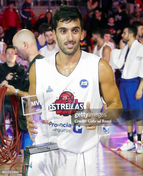 Facundo Campazzo of the White Team receives the MVP trophy at the end the 29th Liga Nacional All-Star Game at Roberto Pando Sports Center of San...