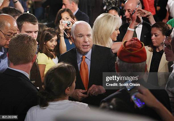 Republican presidential candidate Senator John McCain greets attendees at a town-hall style meeting at the Racine Civic Center July 31, 2008 in...