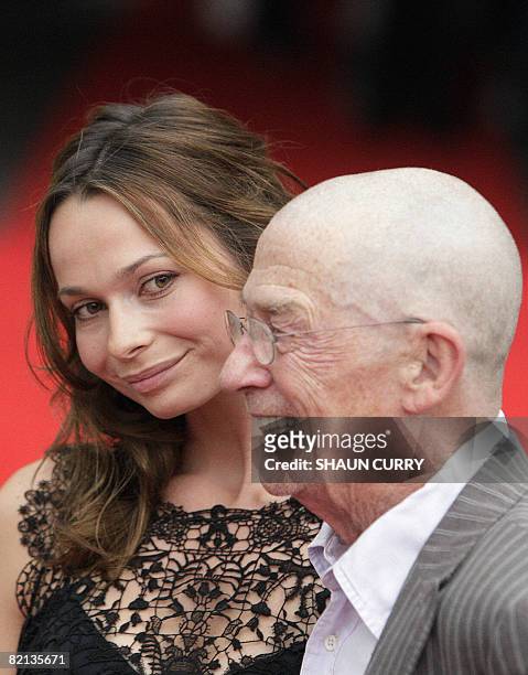 British actress Anna Walton and British actor John Hurt arrive at London's Somerset House for the Peoples Premier of the film Hellboy - Golden Army...