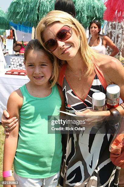 Kelly Ripa and Lola Grace Consuelos attend the Ovarian Cancer Research Fund's Super Saturday 11 benefit hosted by Donna Karan at Nova's Ark Project...