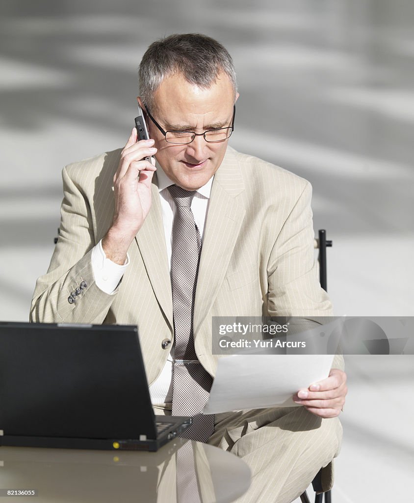 Businessman talking on cell phone