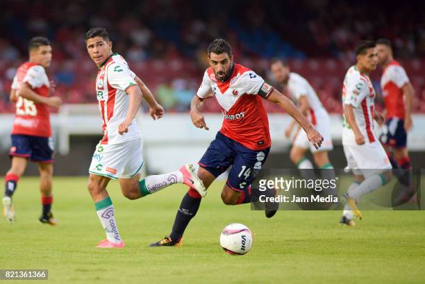 Cristian Pellerano of Veracruz and Manuel Iturra of Necaxa fight for the ball during the 1st round match between Veracruz and Necaxa as part of the...