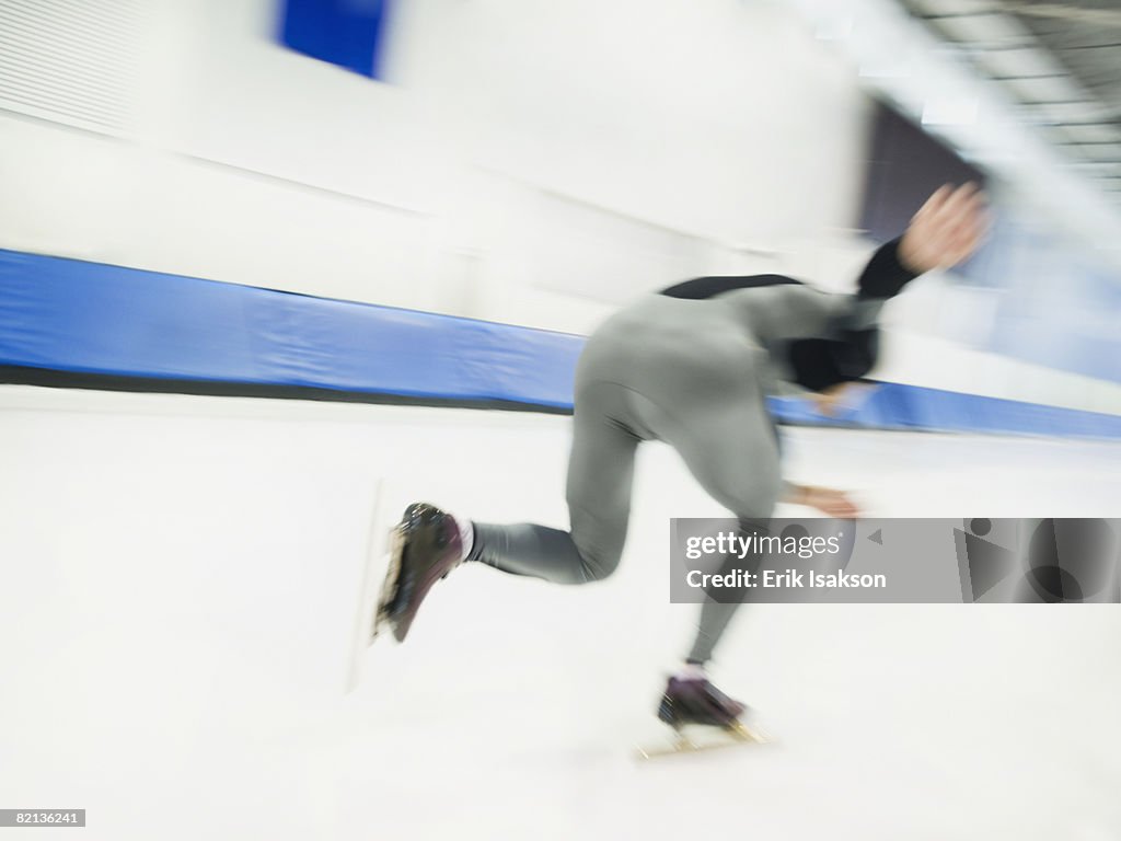 Male speed skater skating