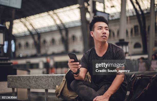 guy leaving town - subway station stock pictures, royalty-free photos & images