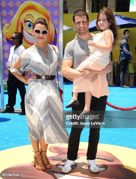 Actor Max Greenfield, wife Tess Sanchez and daughter Lilly Greenfield attend the premiere of "The Emoji Movie" at Regency Village Theatre on July 23,...