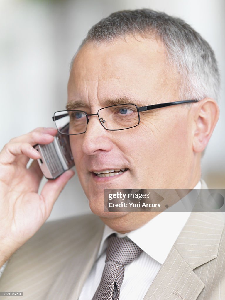 Businessman talking on cell phone