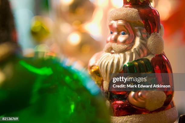 close up of christmas ornament - santa close up stock-fotos und bilder