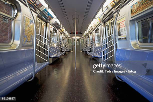 interior of subway train, new york city, new york, united states - new york city subway stock-fotos und bilder