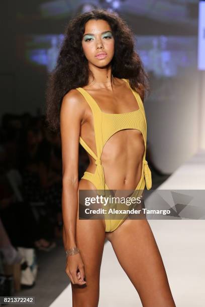 Model walks the runway at SWIMMIAMI INDAH 2018 Collection at SWIMMIAMI tent on July 23, 2017 in Miami Beach, Florida.