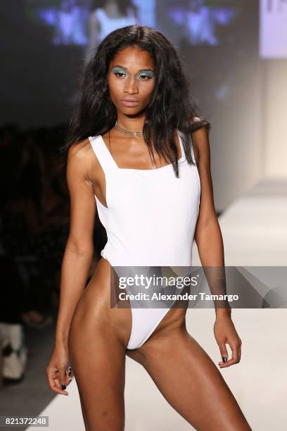 Model walks the runway at SWIMMIAMI INDAH 2018 Collection at SWIMMIAMI tent on July 23, 2017 in Miami Beach, Florida.