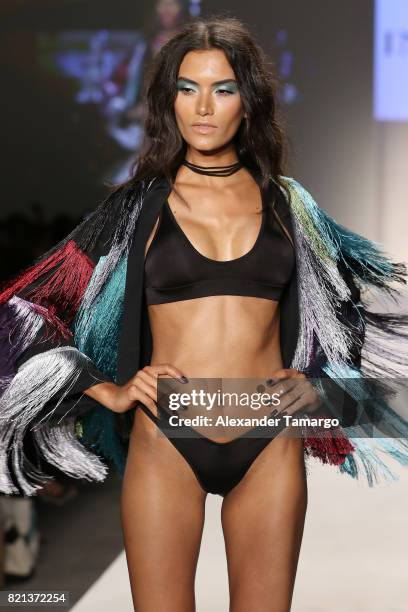 Model walks the runway at SWIMMIAMI INDAH 2018 Collection at SWIMMIAMI tent on July 23, 2017 in Miami Beach, Florida.