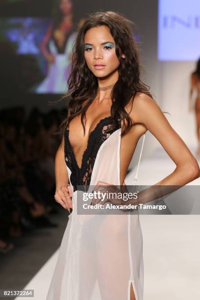 Model walks the runway at SWIMMIAMI INDAH 2018 Collection at SWIMMIAMI tent on July 23, 2017 in Miami Beach, Florida.