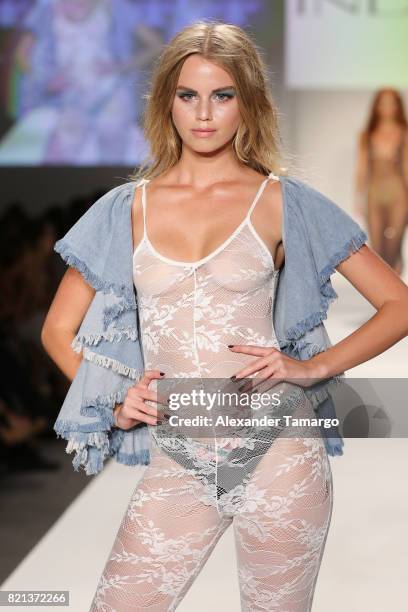 Model walks the runway at SWIMMIAMI INDAH 2018 Collection at SWIMMIAMI tent on July 23, 2017 in Miami Beach, Florida.