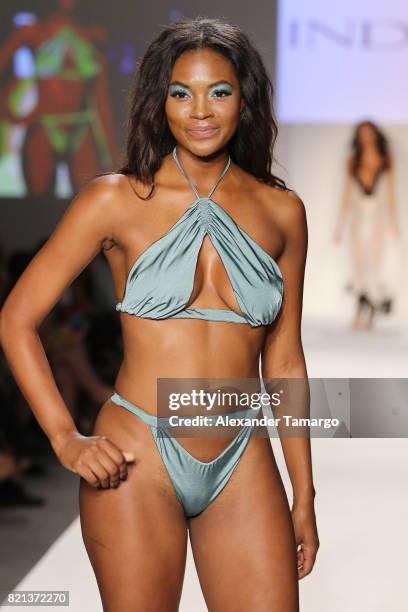 Model walks the runway at SWIMMIAMI INDAH 2018 Collection at SWIMMIAMI tent on July 23, 2017 in Miami Beach, Florida.