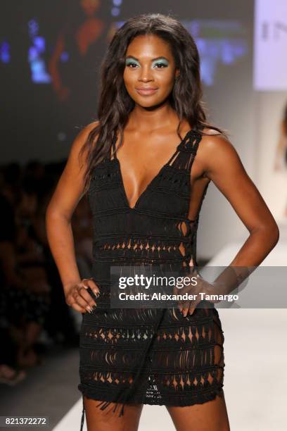 Model walks the runway at SWIMMIAMI INDAH 2018 Collection at SWIMMIAMI tent on July 23, 2017 in Miami Beach, Florida.