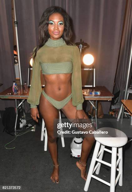 Model prepares backstage for SWIMMIAMI INDAH 2018 Collection at SWIMMIAMI tent on July 23, 2017 in Miami Beach, Florida.