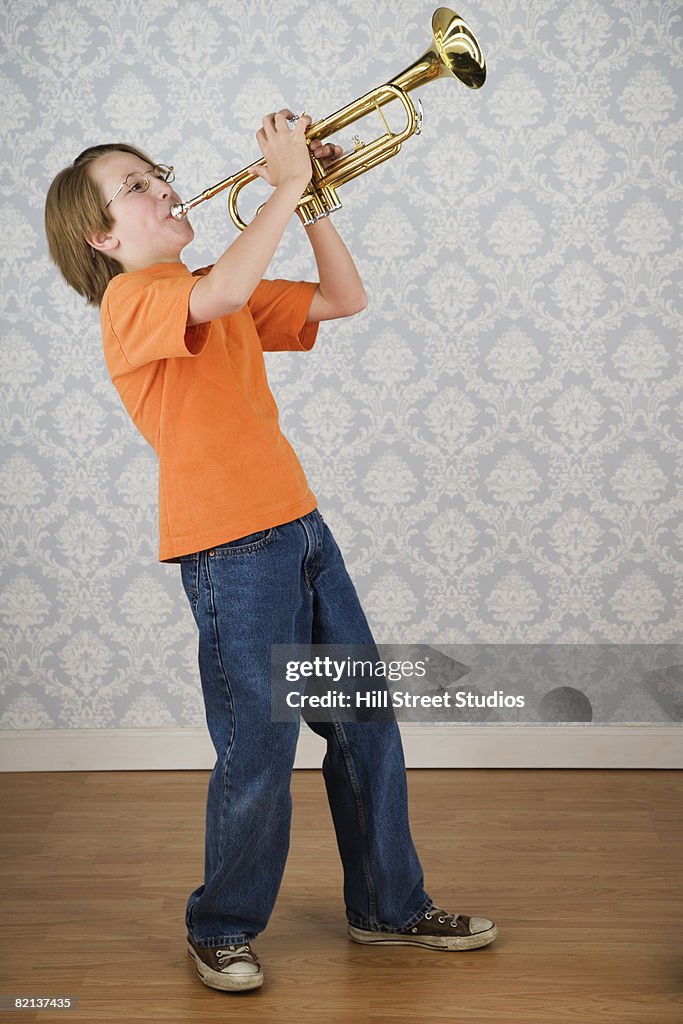 Boy playing trumpet