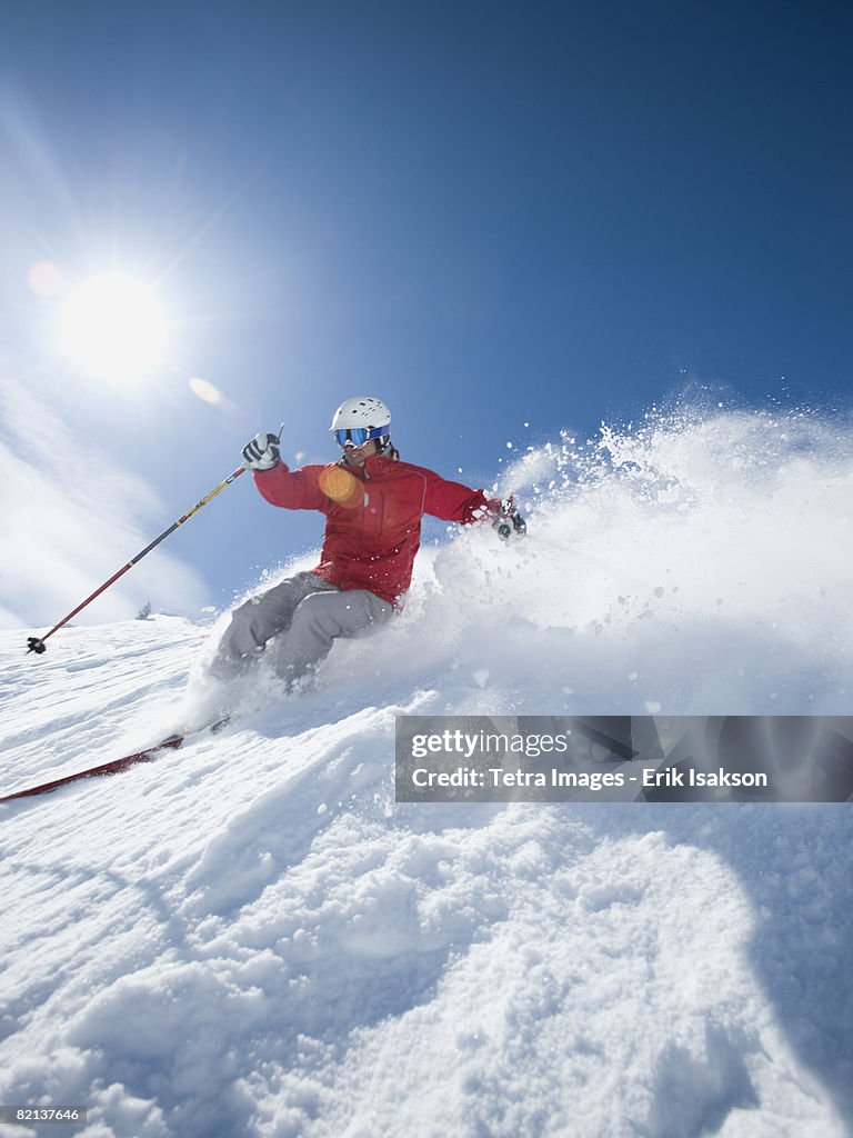 Man skiing downhill