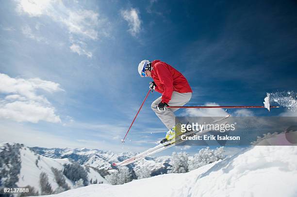man in air on skis - downhill skiing fotografías e imágenes de stock