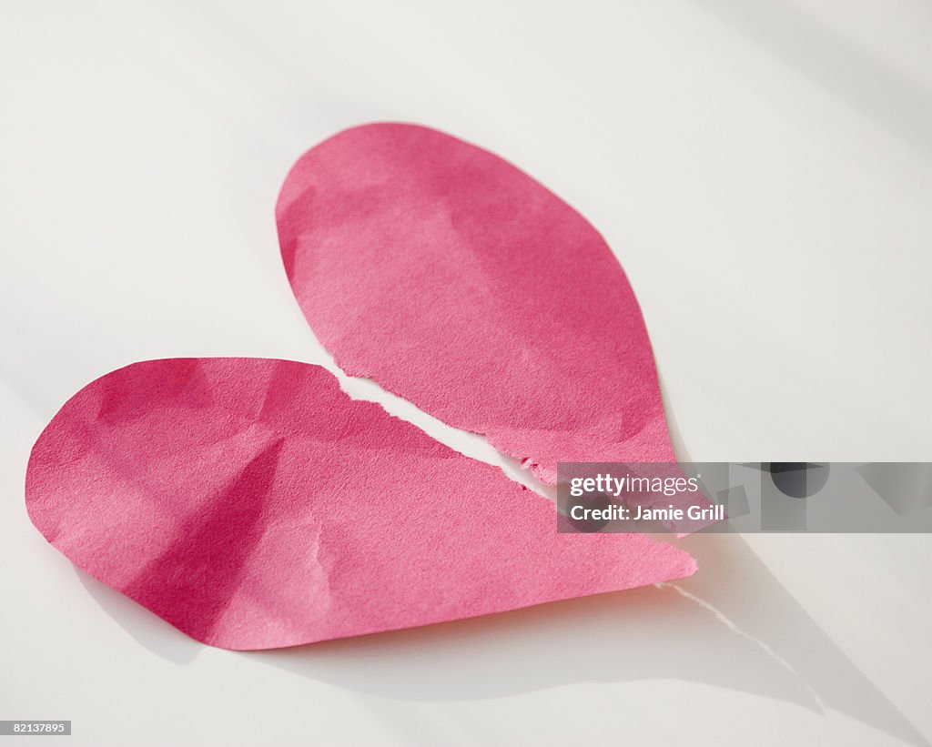 Paper heart ripped in half