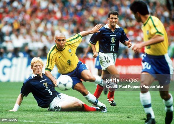 World Cup Finals, St, Denis, France, 10th June Brazil 2 v Scotland 1, Brazil's Ronaldo on the attack as Scotland's Colin Hendry and John Collins look...
