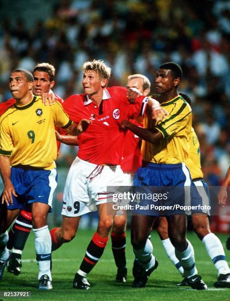 World Cup Finals, Marseille, France, 23rd June Brazil 1 v Norway 2, Norway's Tore Andre Flo tangles with Brazil's Ronaldo and Junior Baiano