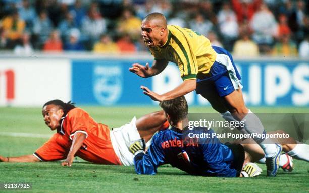 World Cup Finals, Marseille, France, Semi-Final, 7th July Brazil 1 v Holland 1, , Brazil's Ronaldo is stopped by Holland's Edgar Davids and...