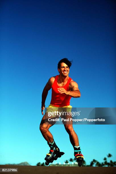 Volume 2, Page 11, Picture 1, Sport, A man wearing a red vest and yellow shorts roller blading