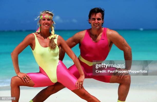 Volume 2, Page 13, Picture 10, Health & Fitness,beach aerobics, Man and woman exercising on beach