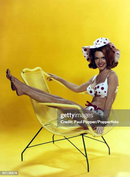 American actress Jane Wald posing in matching bikini and hat, circa 1965.