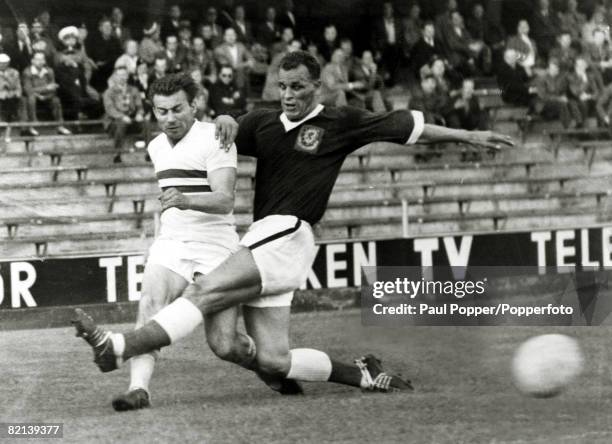 World Cup Finals in Sweden, Wales v Hungary in Stockholm, John Charles of Wales rushes in to challenge Hungary's Budai